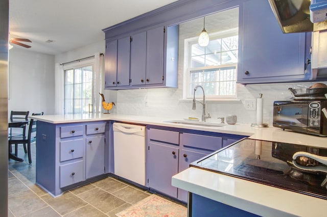 kitchen featuring ceiling fan, light tile flooring, dishwasher, tasteful backsplash, and sink