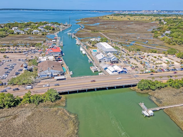drone / aerial view of a large body of water and a notable bridge