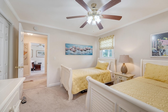 bedroom with light carpet, crown molding, a ceiling fan, and a closet