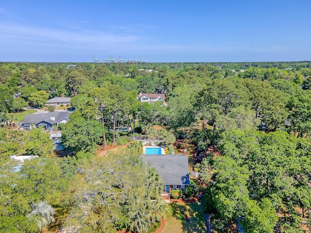 drone / aerial view of a heavily wooded area