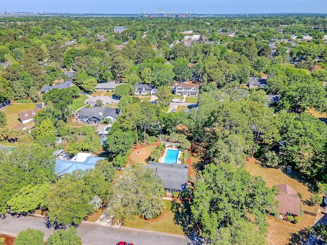 aerial view of property's location with a pool