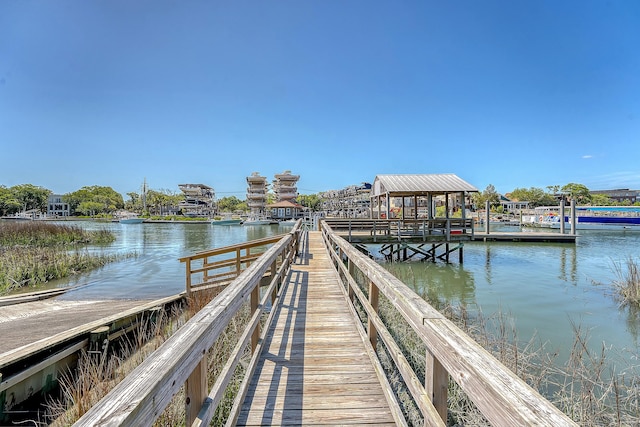 dock area featuring a water view