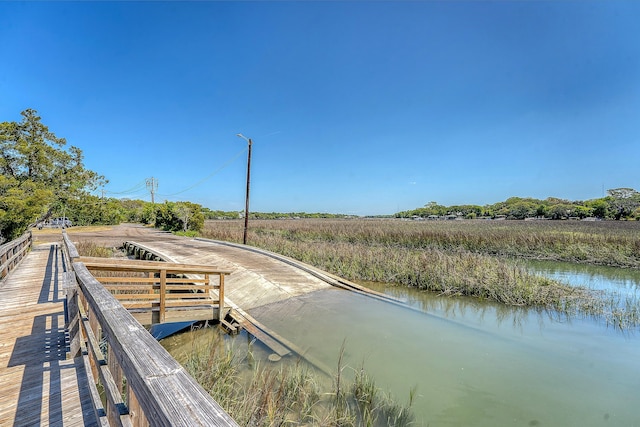 dock area featuring a water view