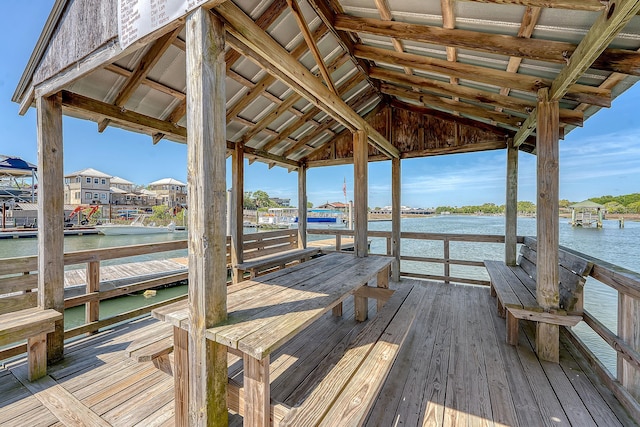 dock area with a water view