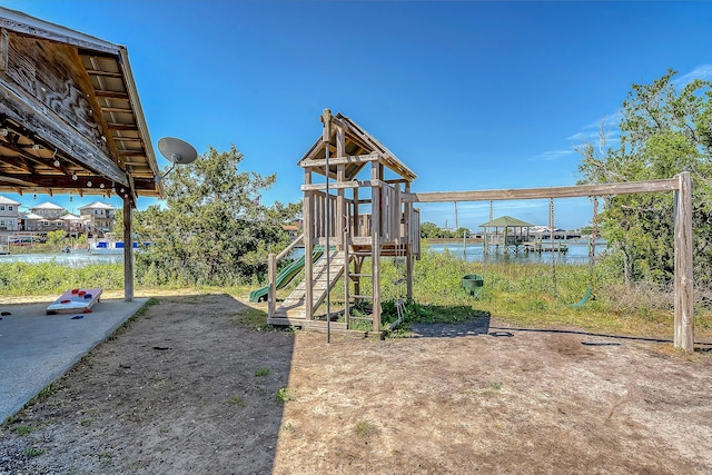 community play area featuring a water view