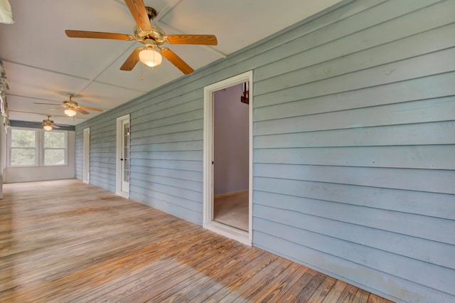 wooden deck with ceiling fan