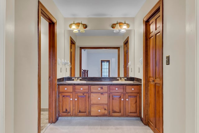 bathroom featuring double vanity and tile patterned flooring