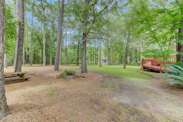 view of yard featuring a deck