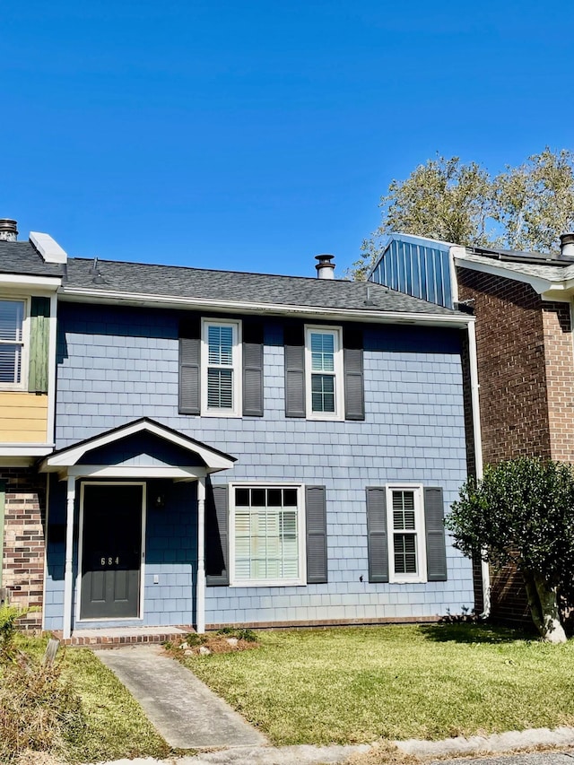 view of front of house with a front yard