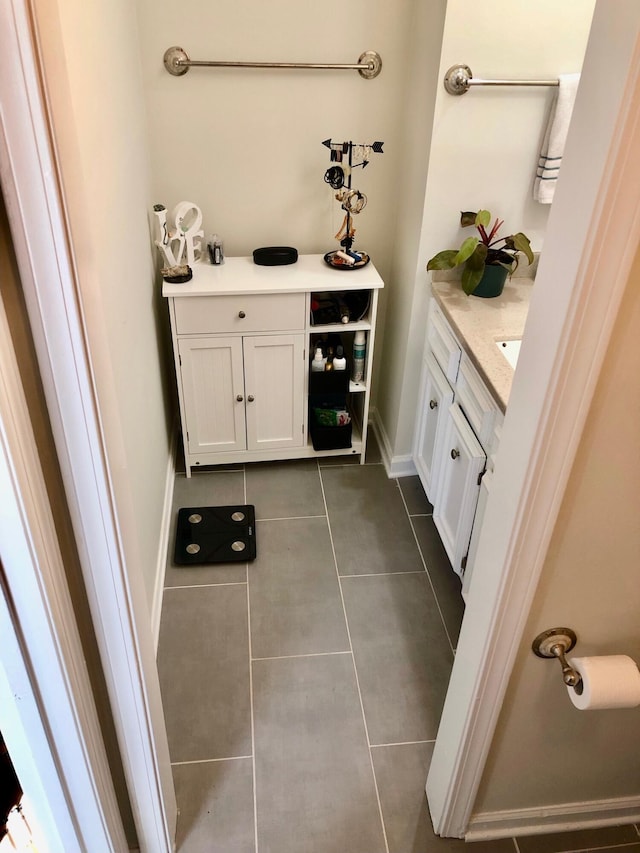 bathroom featuring tile patterned floors and vanity