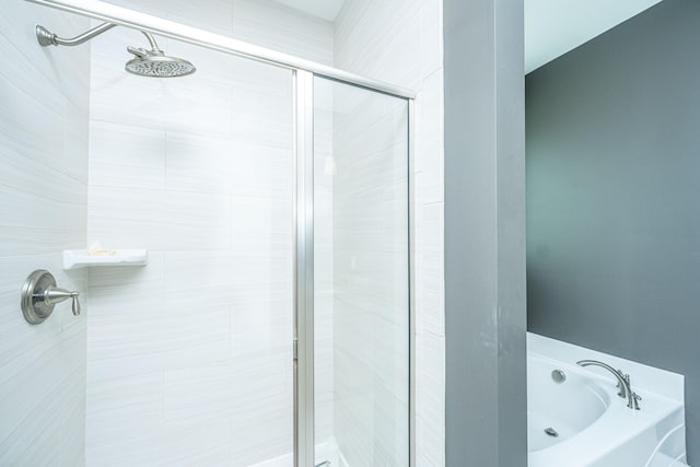 bathroom with independent shower and bath