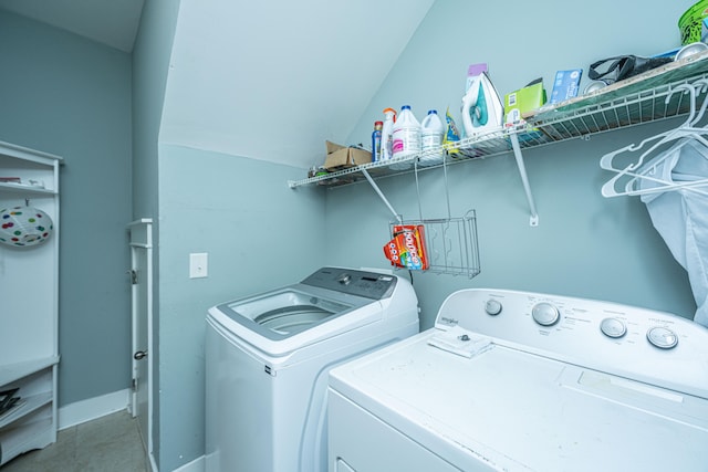 washroom with washing machine and dryer