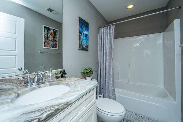 full bathroom featuring shower / tub combo with curtain, vanity, and toilet