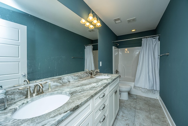 full bathroom featuring vanity, shower / bath combo with shower curtain, and toilet