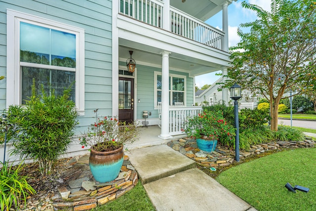 entrance to property with a balcony