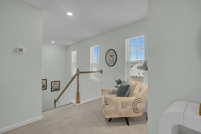 sitting room with light carpet