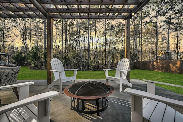 view of patio with an outdoor fire pit and a pergola