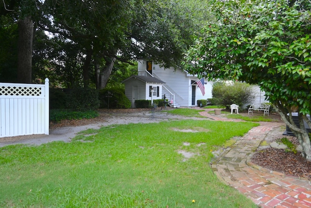 view of yard featuring fence