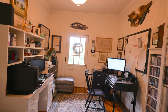 office area with wood finished floors and ornamental molding