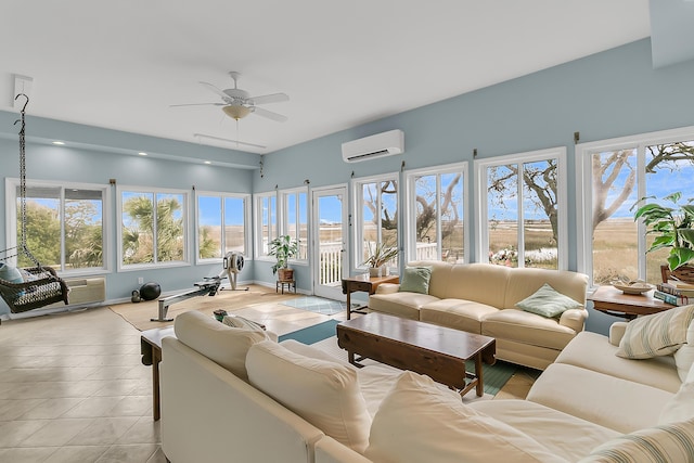 sunroom / solarium featuring ceiling fan and a wall mounted AC