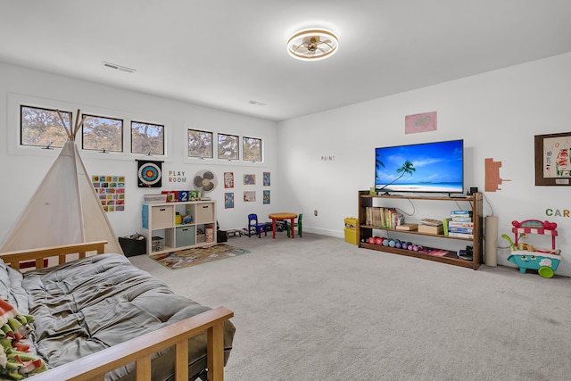 game room with visible vents and carpet flooring