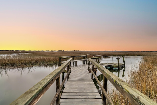 view of dock with a water view