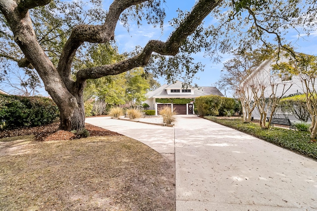 view of front of home with a garage and driveway