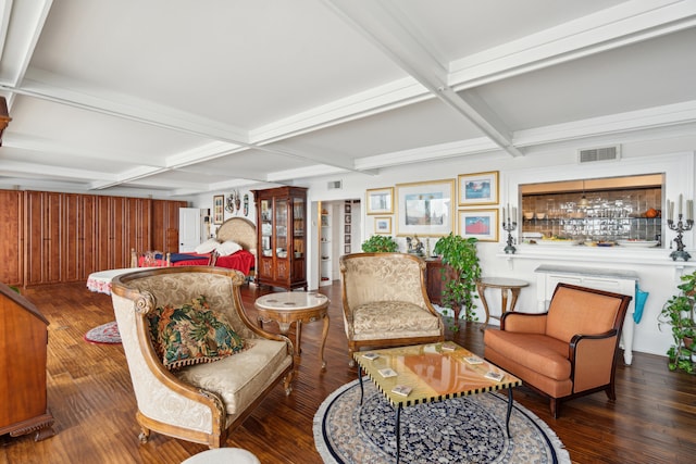 interior space with coffered ceiling, beamed ceiling, and dark wood-type flooring