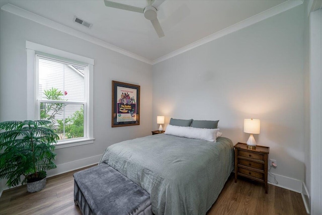 2408 Bent Oak Rd, Mount Pleasant, SC 29466 - bedroom with wood finished floors, ornamental molding, and a ceiling fan