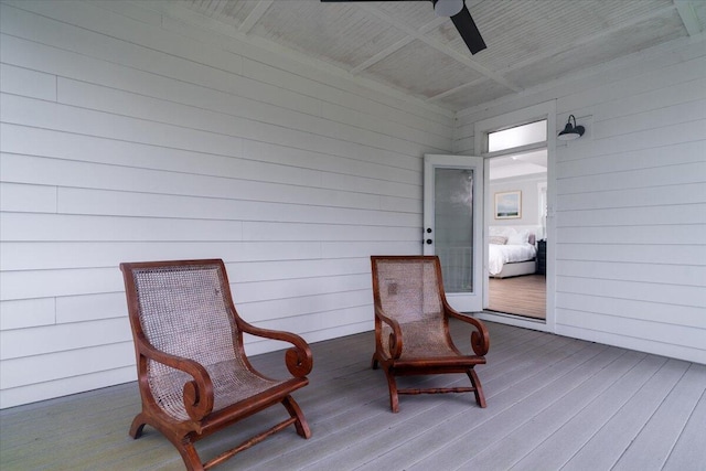 2408 Bent Oak Rd, Mount Pleasant, SC 29466 - living area featuring a ceiling fan, wood finished floors, and wood walls