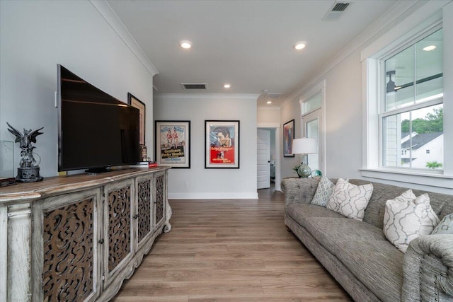 2408 Bent Oak Rd, Mount Pleasant, SC 29466 - living area with crown molding, light wood finished floors, and recessed lighting