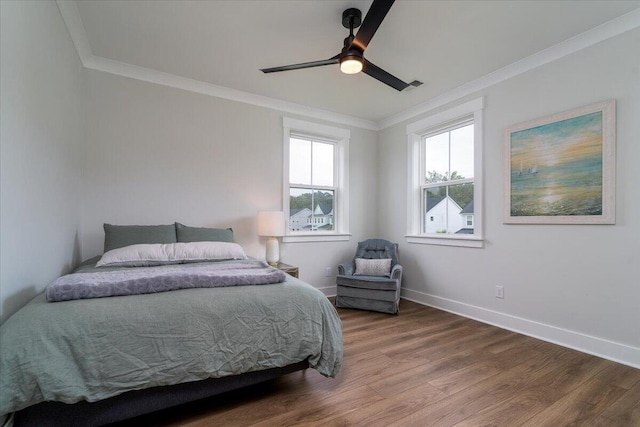 2408 Bent Oak Rd, Mount Pleasant, SC 29466 - bedroom with wood finished floors, crown molding, and ceiling fan