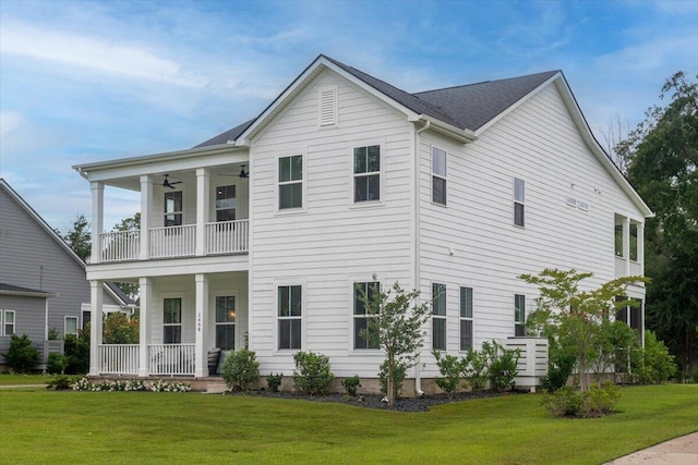 2408 Bent Oak Rd, Mount Pleasant, SC 29466 - view of front of property with a balcony, a porch, a ceiling fan, and a front yard