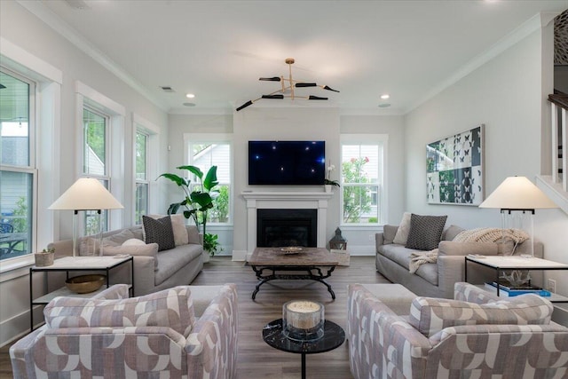 2408 Bent Oak Rd, Mount Pleasant, SC 29466 - living room featuring healthy amount of natural light, crown molding, wood finished floors, a fireplace, and recessed lighting
