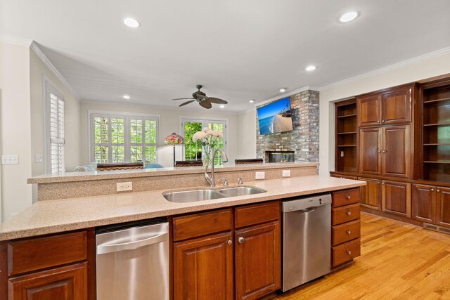 kitchen with stainless steel dishwasher, open shelves, a sink, crown molding, and a ceiling fan