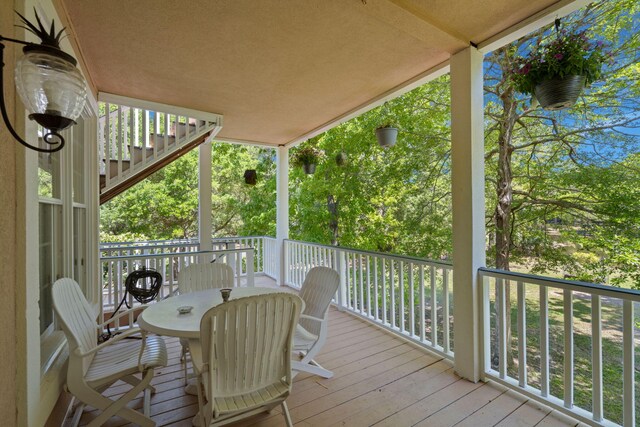 deck featuring outdoor dining area