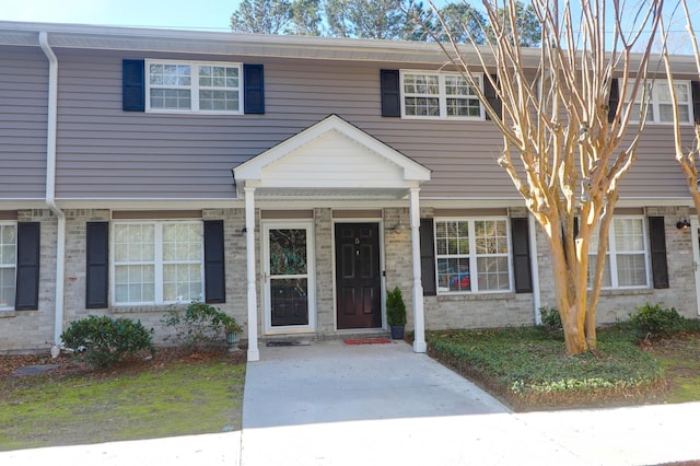 multi unit property featuring brick siding