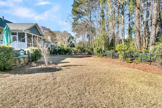 view of yard with a sunroom