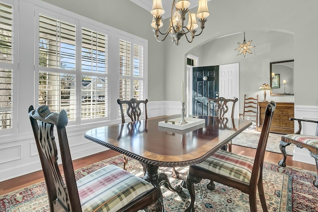 dining room featuring a notable chandelier and wood-type flooring