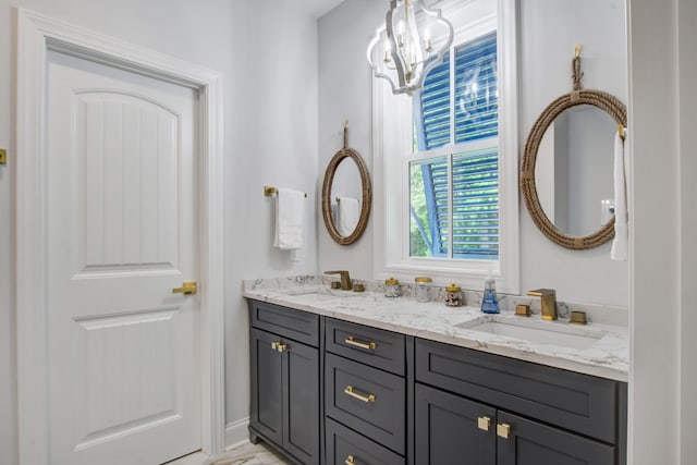 16 Oakwood Ln, Edisto Island, SC 29438 - full bath with double vanity and a chandelier