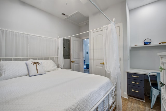 16 Oakwood Ln, Edisto Island, SC 29438 - bedroom featuring electric panel, wood finished floors, and an office area
