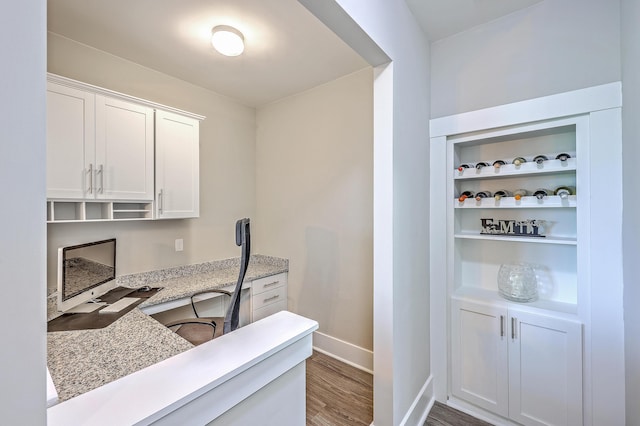 2336 Brinkley Rd, Johns Island, SC 29455 - kitchen with white cabinetry, wood finished floors, baseboards, an office area, and open shelves