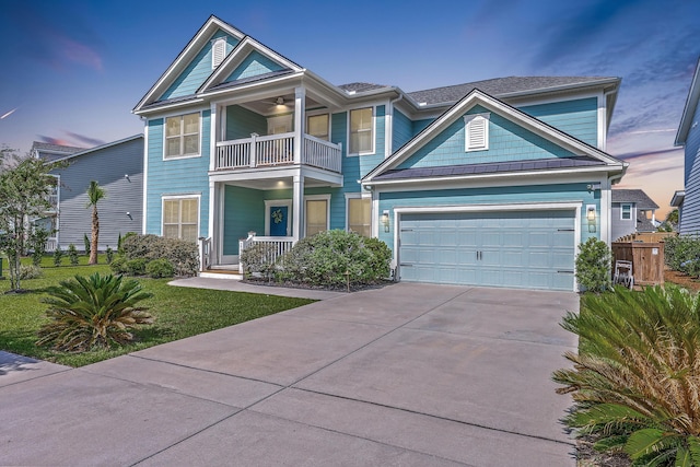2336 Brinkley Rd, Johns Island, SC 29455 - view of front facade with a balcony, driveway, and a porch