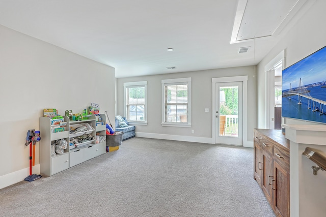 2336 Brinkley Rd, Johns Island, SC 29455 - playroom with attic access, light colored carpet, and plenty of natural light