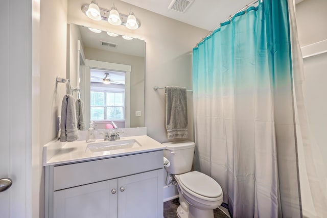 2336 Brinkley Rd, Johns Island, SC 29455 - bathroom featuring toilet, vanity, and curtained shower