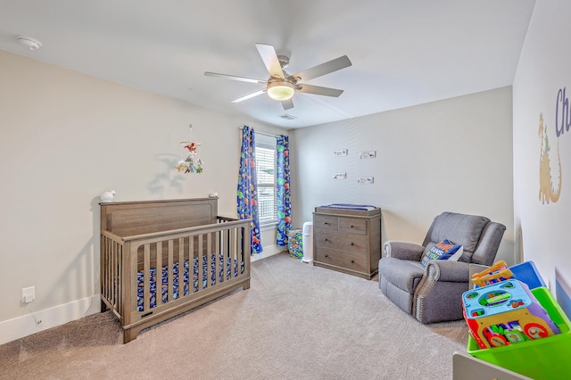 2336 Brinkley Rd, Johns Island, SC 29455 - bedroom with a nursery area, carpet, baseboards, and ceiling fan