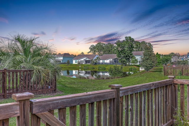 2336 Brinkley Rd, Johns Island, SC 29455 - yard at dusk featuring a water view