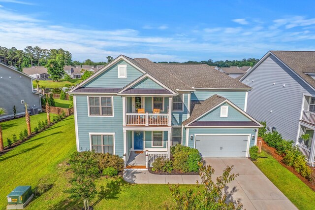 2336 Brinkley Rd, Johns Island, SC 29455 - view of front of house with a balcony, concrete driveway, a front lawn, an attached garage, and a porch