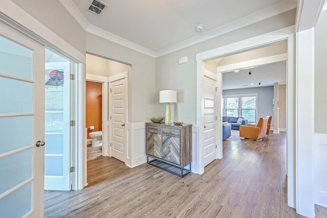 2336 Brinkley Rd, Johns Island, SC 29455 - hallway with wood finished floors and crown molding