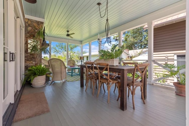 sunroom featuring wooden ceiling and ceiling fan